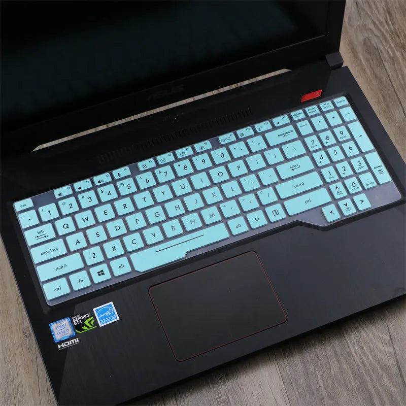 ASUS Flight laptop keyboard protective film cover shown in a translucent colour option on a laptop.