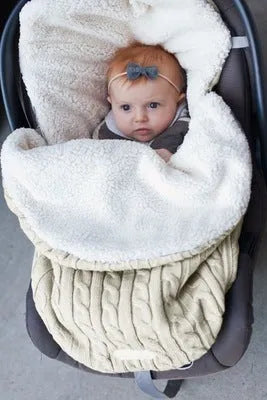 Baby stroller sleeping bag with thick filling in envelope design, shown in beige colour.