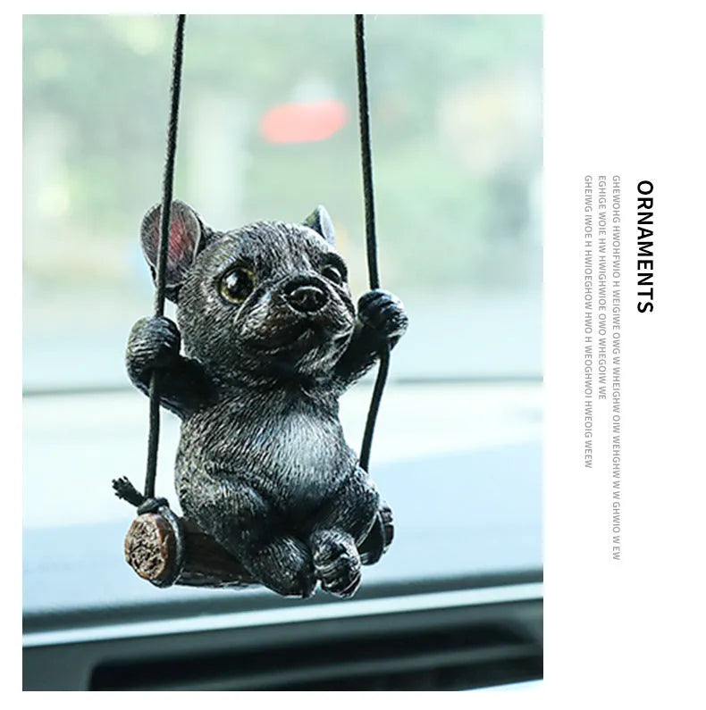Resin cartoon bulldog car hanging ornament for a rearview mirror in various colours.