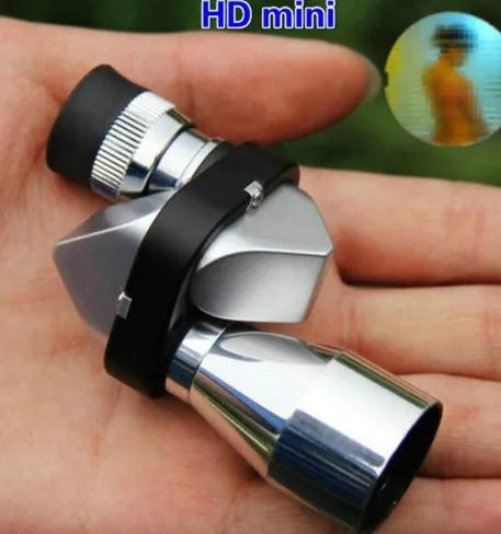 Compact silver aluminium alloy 8x20 pocket monocular telescope with lens caps, on a canvas bag with cleaning cloth.