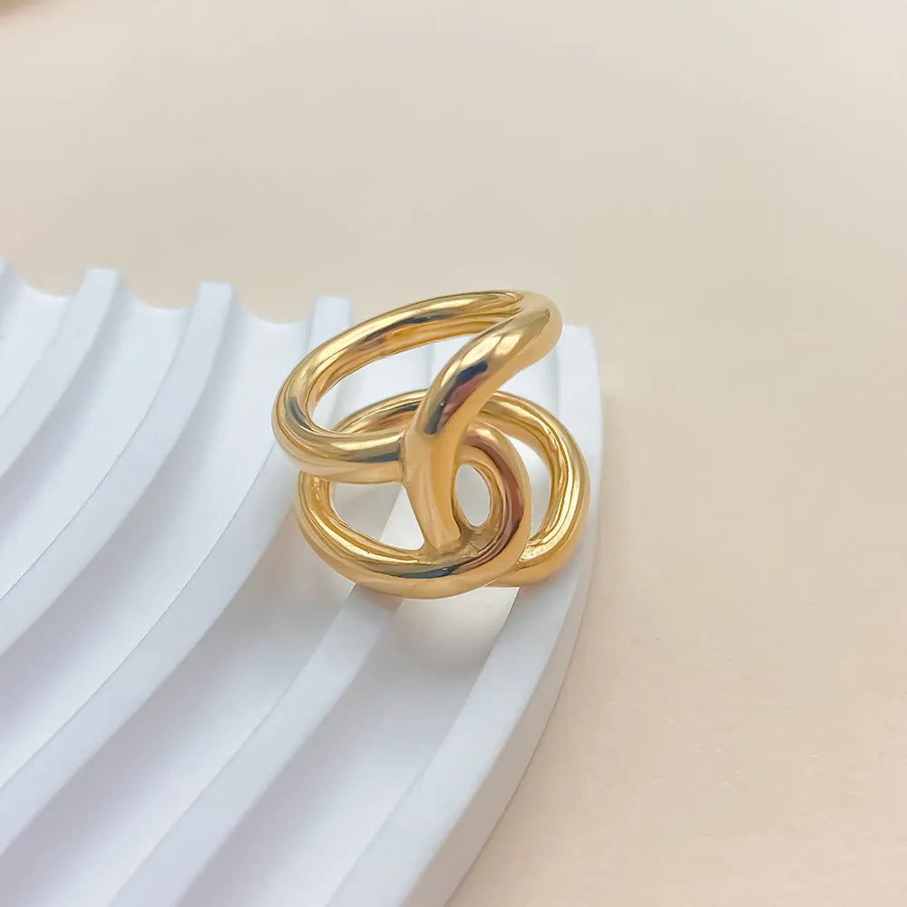 Adjustable knotted ring for women in stainless steel with gold or steel colour finish