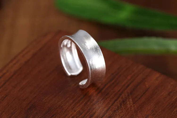 Geometric adjustable open ring with frosted silver electroplated finish