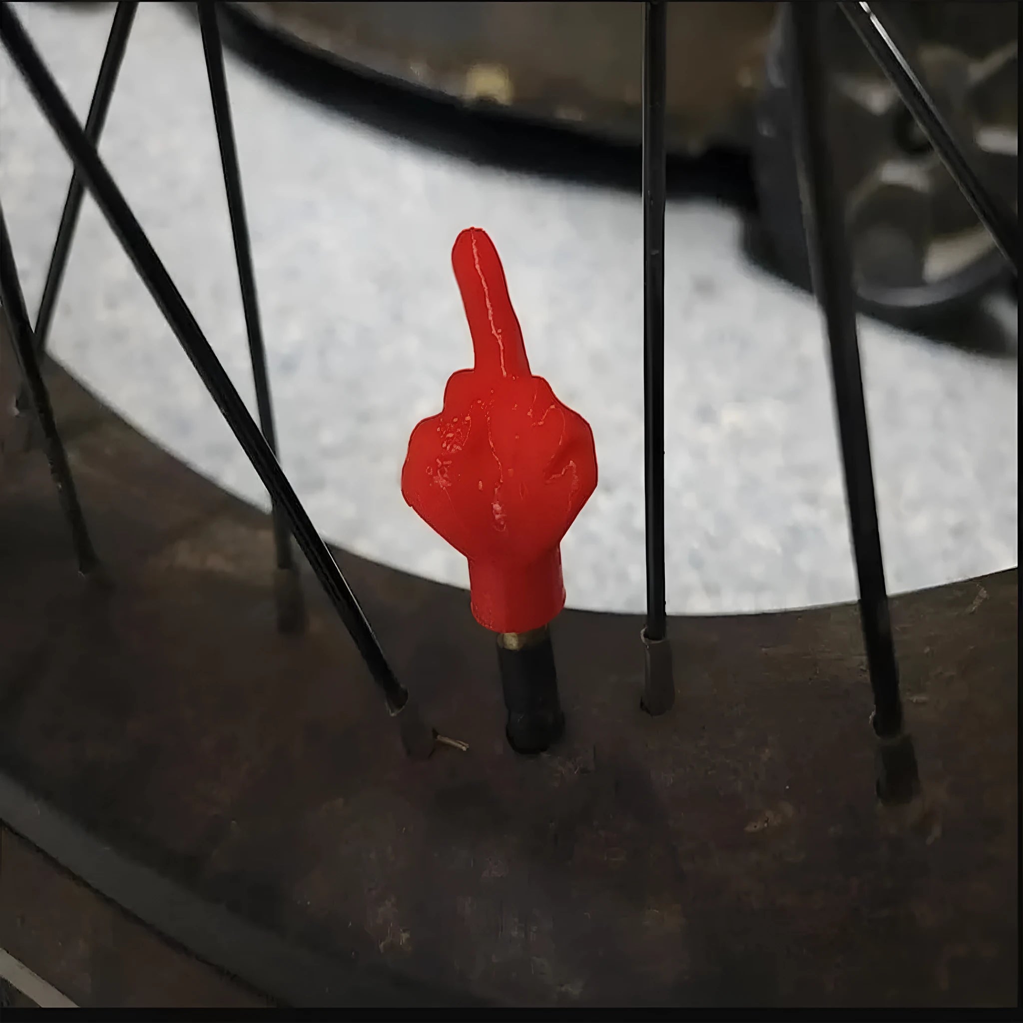 Four skin colour and four black latex car tyre valve caps for dust and moisture protection