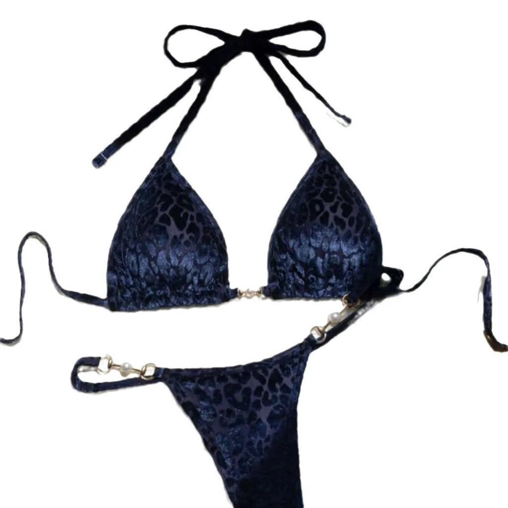 Blue and green leopard print women's bikini set on a mannequin, showing T-shaped design.