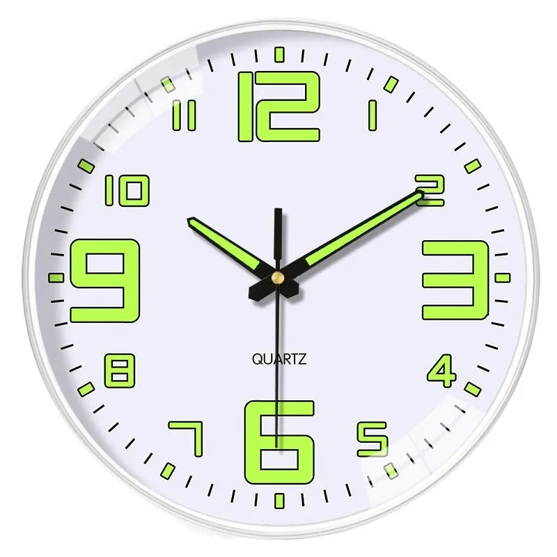 Modern round luminous wall clock 20cm diameter with plastic case on a wall