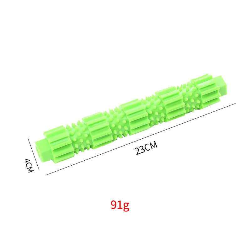 Green and orange natural rubber dog chew toy with treat dispensing hole