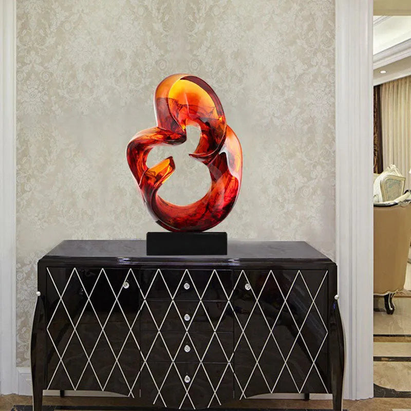 Transparent resin ornament in modern style available in blue or orange red colour