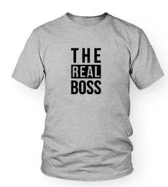 Man's loose fit round neck t-shirt with a graphic print, short sleeves, on a white background.