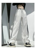 Ribbon parallel bars contrast colour loose straight slim draping trousers in thin fabric
