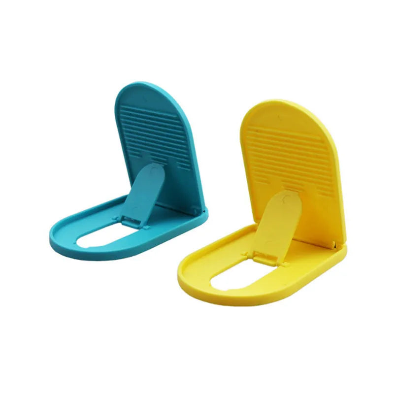 Adjustable plastic mobile phone stand in various colours holding a smartphone