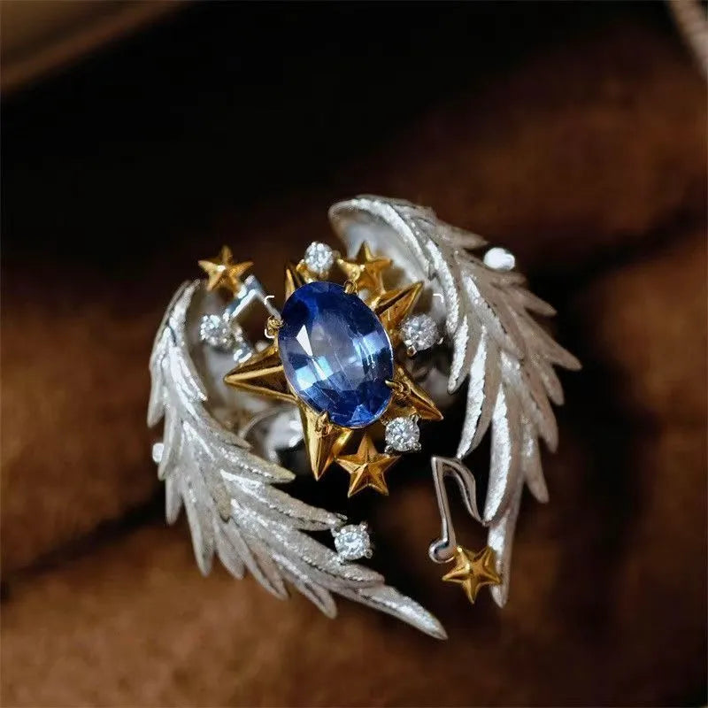 Adjustable geometric angel wings ring in alloy with open mouth design