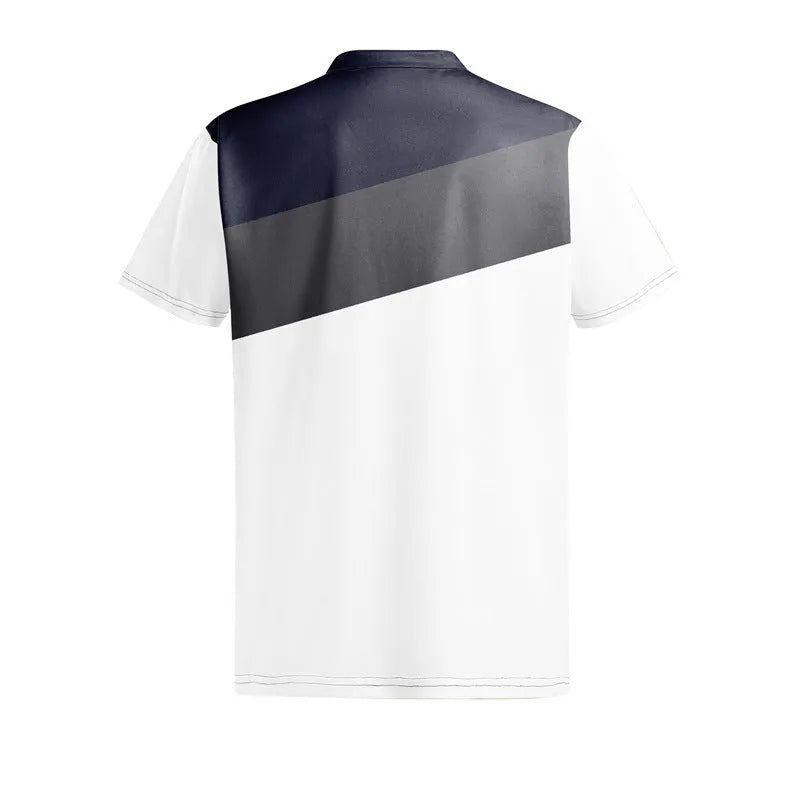 Man wearing a loose fit grey t-shirt with a colourful 3D digital printed abstract pattern on the front.