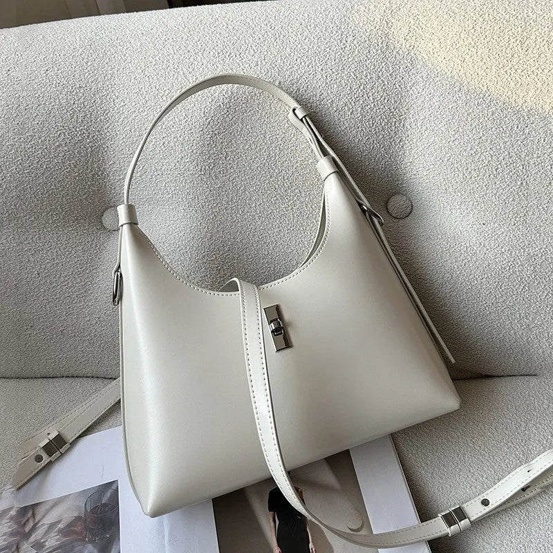Genuine leather dumpling-shaped crossbody bag with organised compartments in six colour options