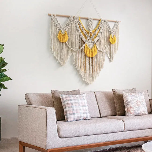 Nordic style woven cotton tapestry in creamy white with yellow accents, rectangular shape measuring 120cm by 95cm