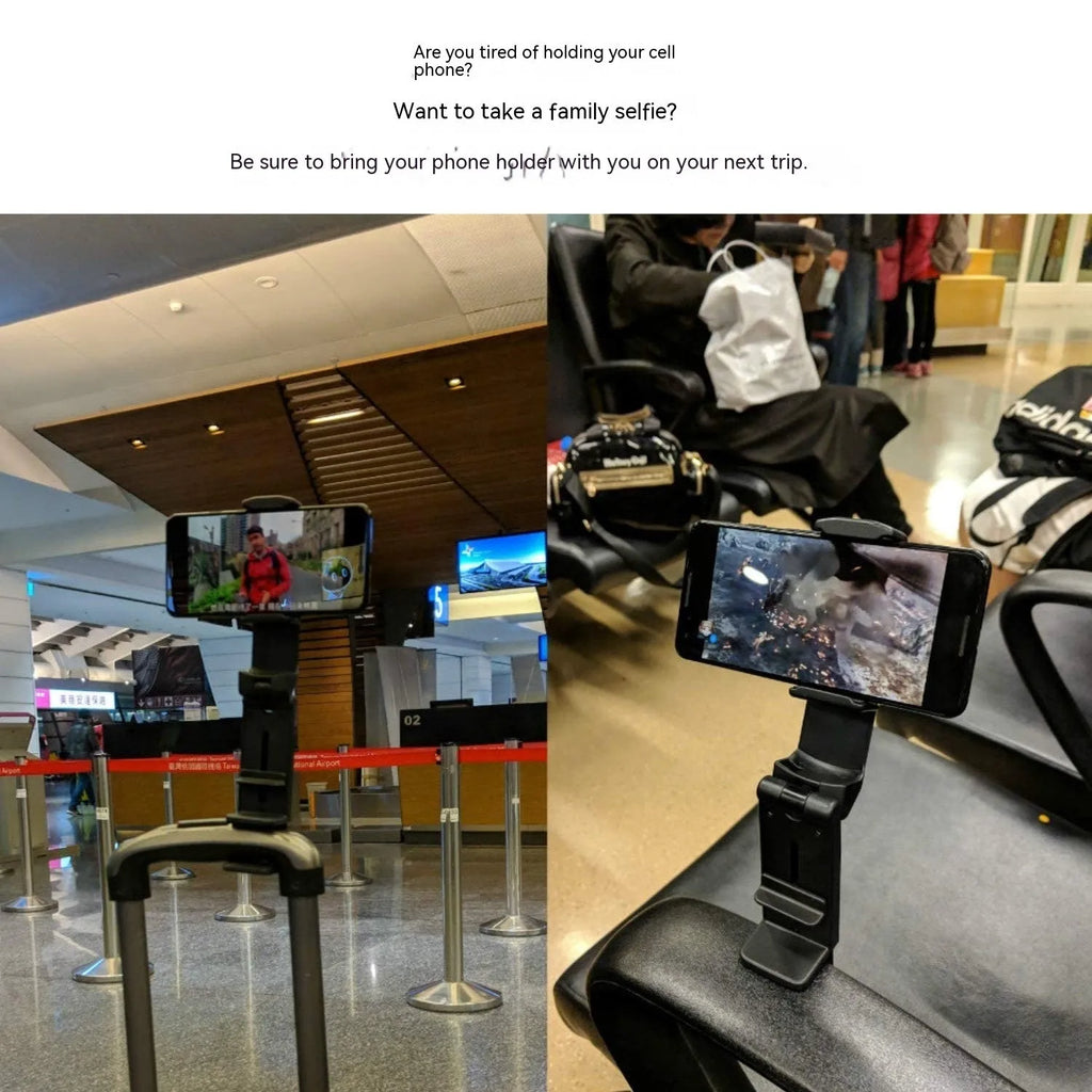 Black foldable rotating phone holder holding a mobile phone on a desk.