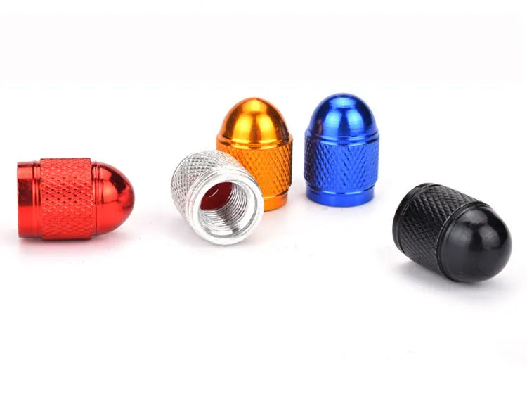 Aluminium alloy mountain bike tyre valve cap shown in gold, red, silver, blue, and black colour options.