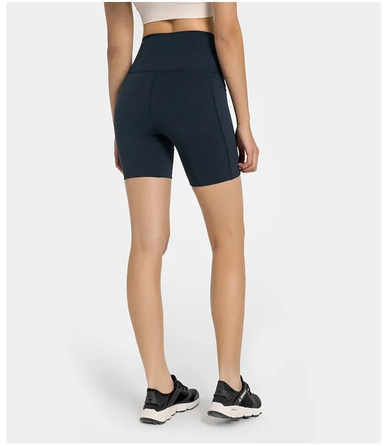 Women's mid-length sports shorts in four colours with super stretch cotton blend fabric for athletic activities