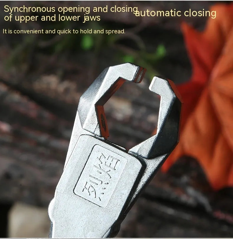 Close-up of a zinc alloy archery release aid with a two-axis harpoon clip mechanism.