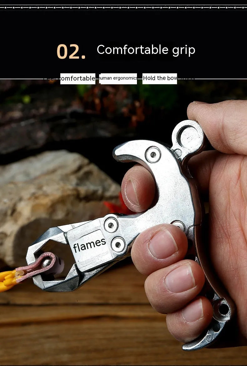 Close-up of a zinc alloy archery release aid with a two-axis harpoon clip mechanism.