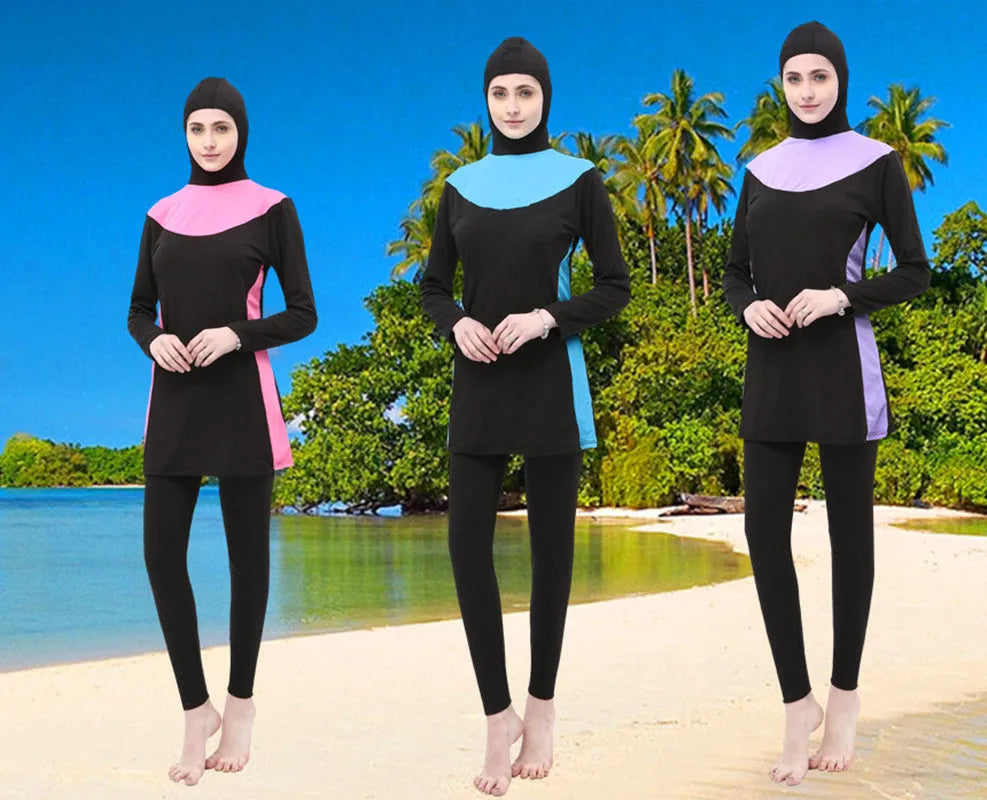 Conservative long-sleeved hooded two-piece swimsuit for women in black with coloured accents.
