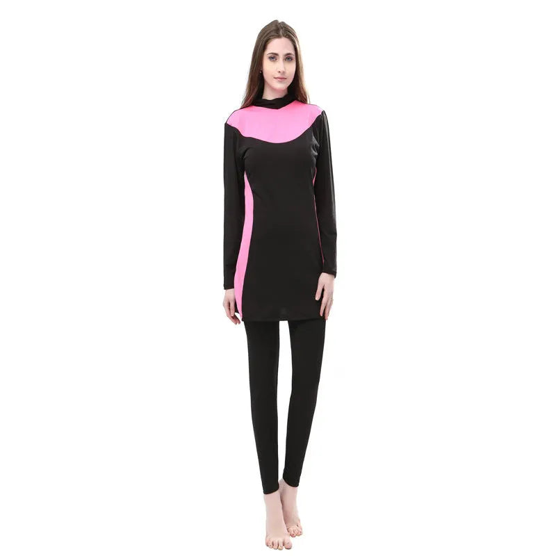 Conservative long-sleeved hooded two-piece swimsuit for women in black with coloured accents.