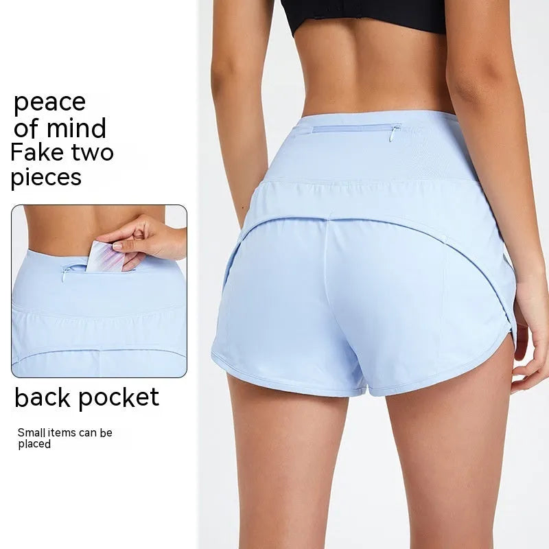 Women's nylon fitness shorts in high-waist design, quick-dry fabric, black/water blue/white colours