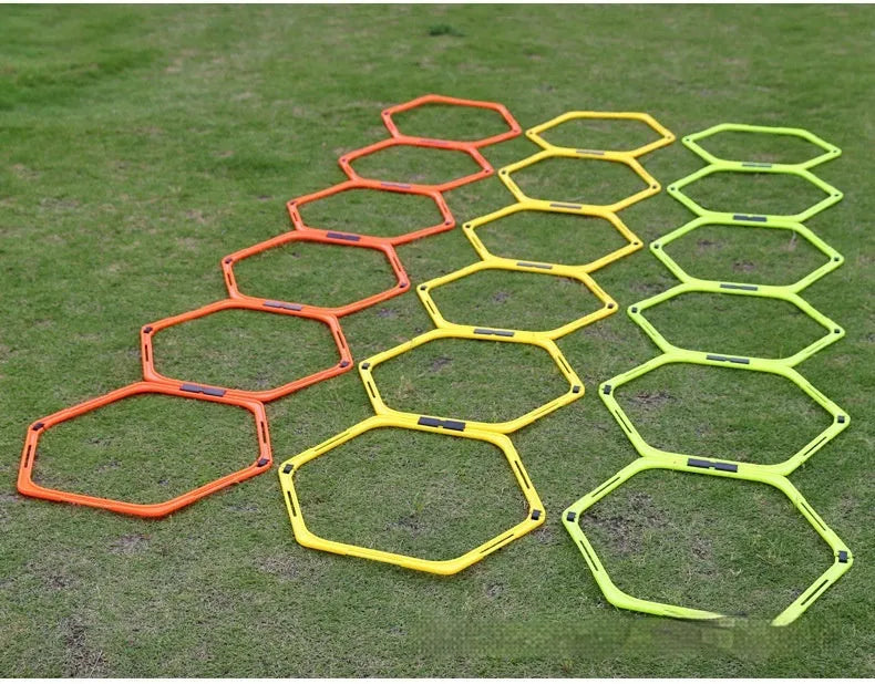 Six foldable hexagon football agility training rings in green, orange, and yellow colours