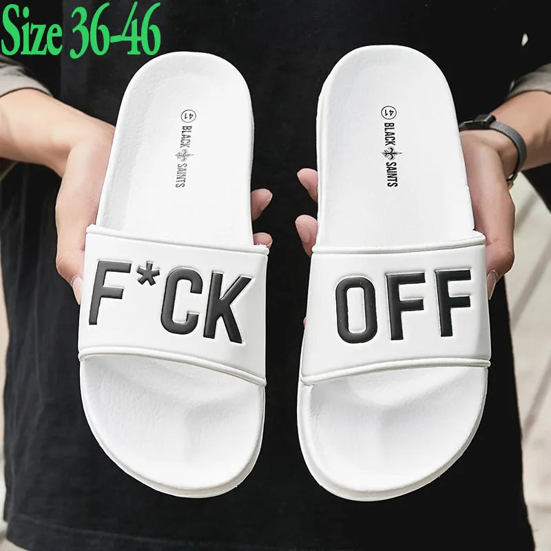 Large men's open toe slippers with a black viscose upper and rubber sole, shown on a size 46 label.