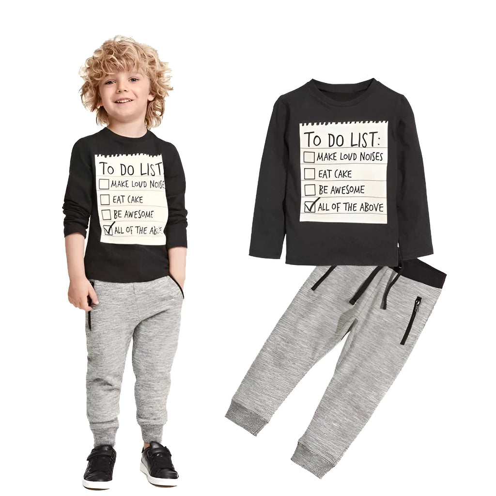 Casual cotton two-piece clothing set for a boy, featuring a long-sleeved T-shirt with letter print and matching trousers.