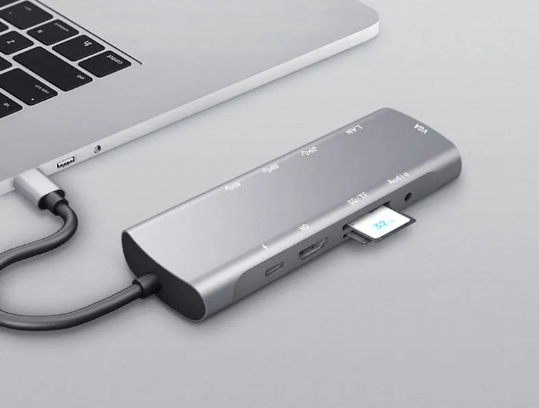 Grey aluminium alloy USBC docking station with HDMI, VGA, and USB ports