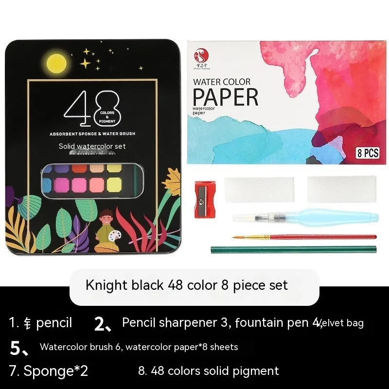 48 colour solid watercolour paint set showing compartmentalised layout with Black Knight, Girl Pink and Sunshine Blue shades