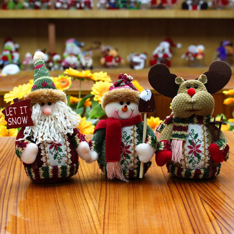Red, green and white felt Christmas snowman decoration measuring 18 by 13 centimetres