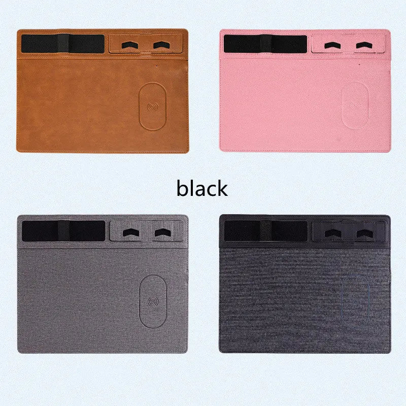 Pink wireless charging mouse pad with phone holder on a desk, dimensions 320mm by 260mm.