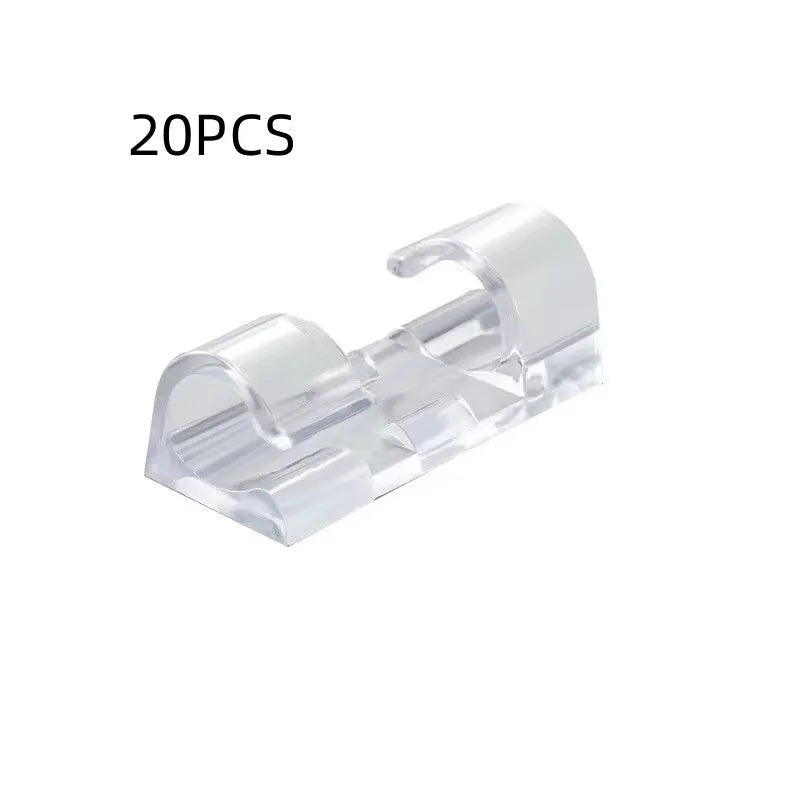 Transparent plastic self-adhesive cable clips in four size variants for wire organisation