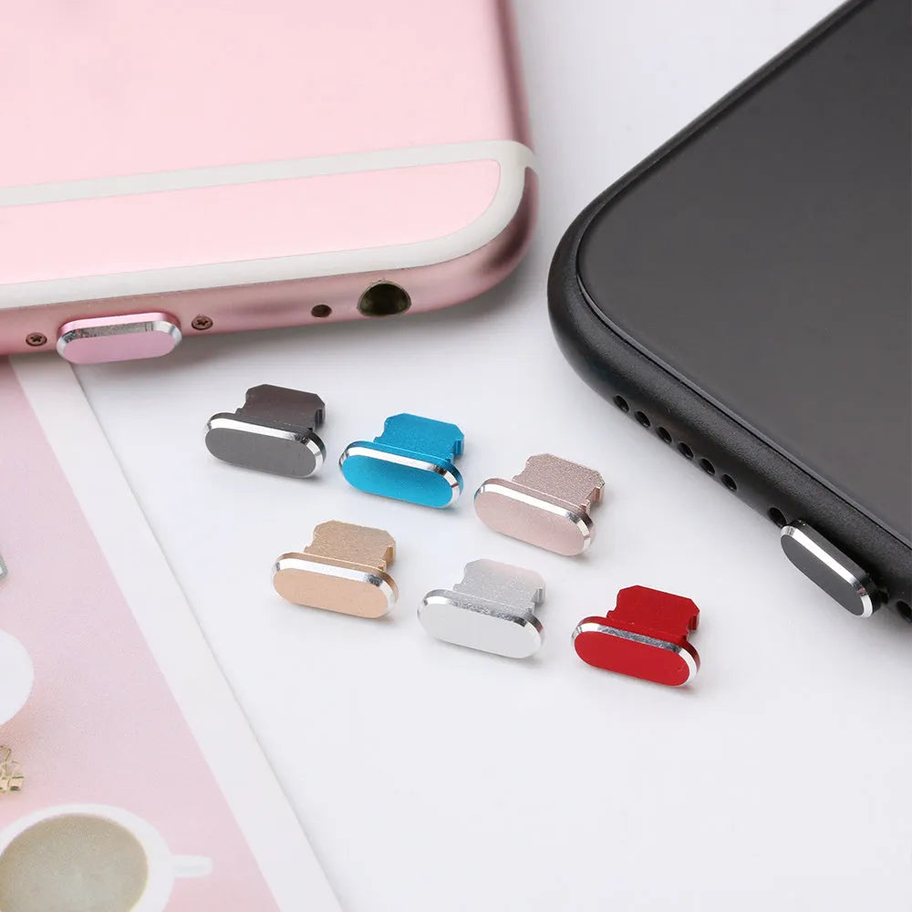 Aluminium alloy mobile phone charging port dust plug for iPhone, shown in a metallic colour.