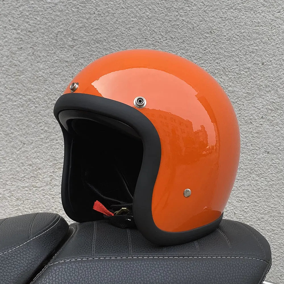 Glass fibre motorcycle half helmet shown in a retro style on a stand.