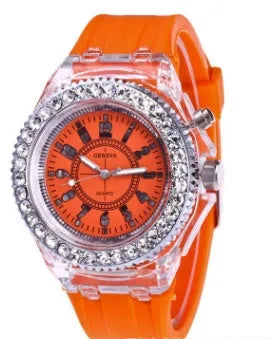 Women's LED luminous quartz watch with round dial, silicone strap, and luminous display features
