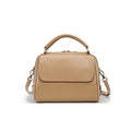 Women's genuine leather crossbody tote bag in apricot colour with double straps and outer slit pocket.