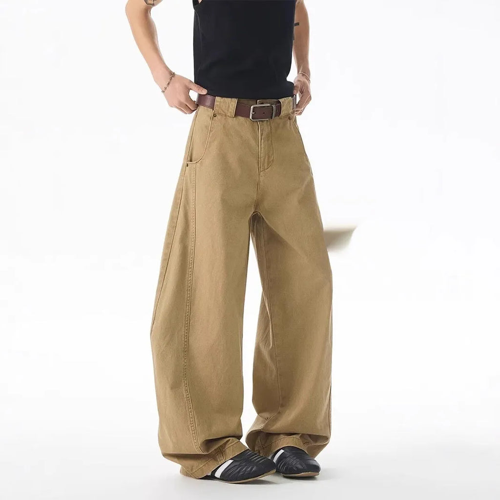 Brown men's loose fit jeans with straight leg design and button fly opening