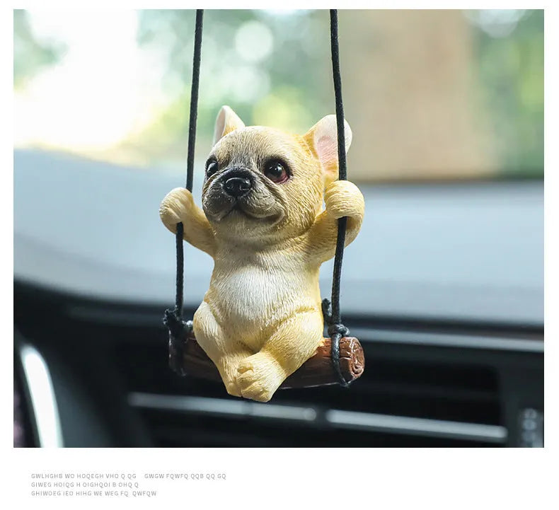 Resin cartoon bulldog car hanging ornament for a rearview mirror in various colours.
