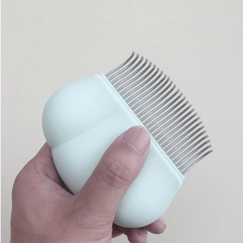 Blue paw-shaped deshedding brush for pets on a white background.