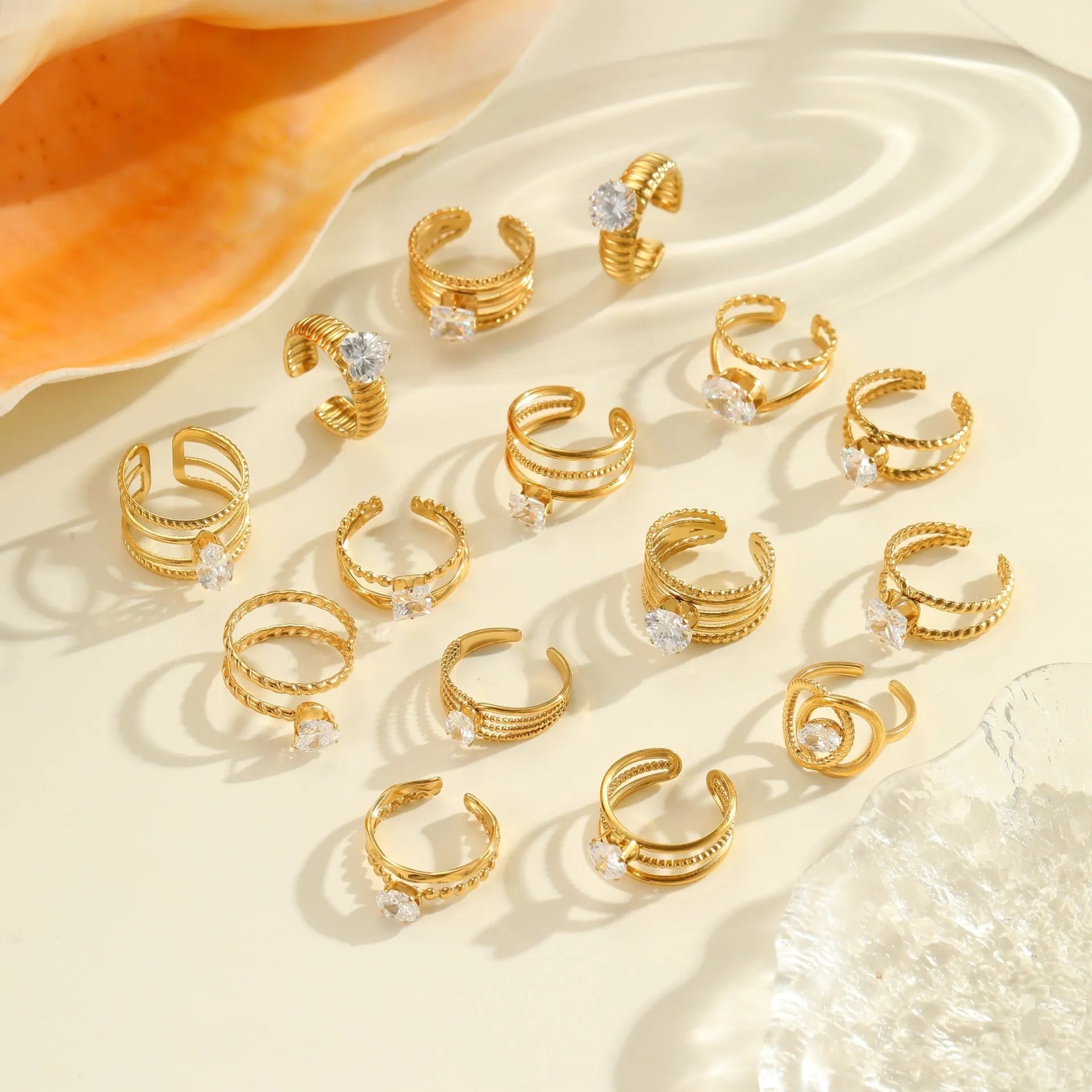 Gold inlaid zircon stainless steel open mouth ring with geometry design featuring heart and drop shapes