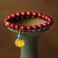 Handcrafted cinnabar bracelet with copper beads in wave design, national style unisex accessory