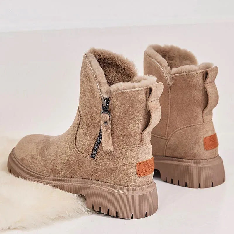 Women's black faux suede high-top snow boots with thick plush lining and a side zipper