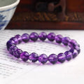 Crystal ametrine bracelet showing 128-cut faceting on beads with choice of amethyst, ametrine or citrine colours