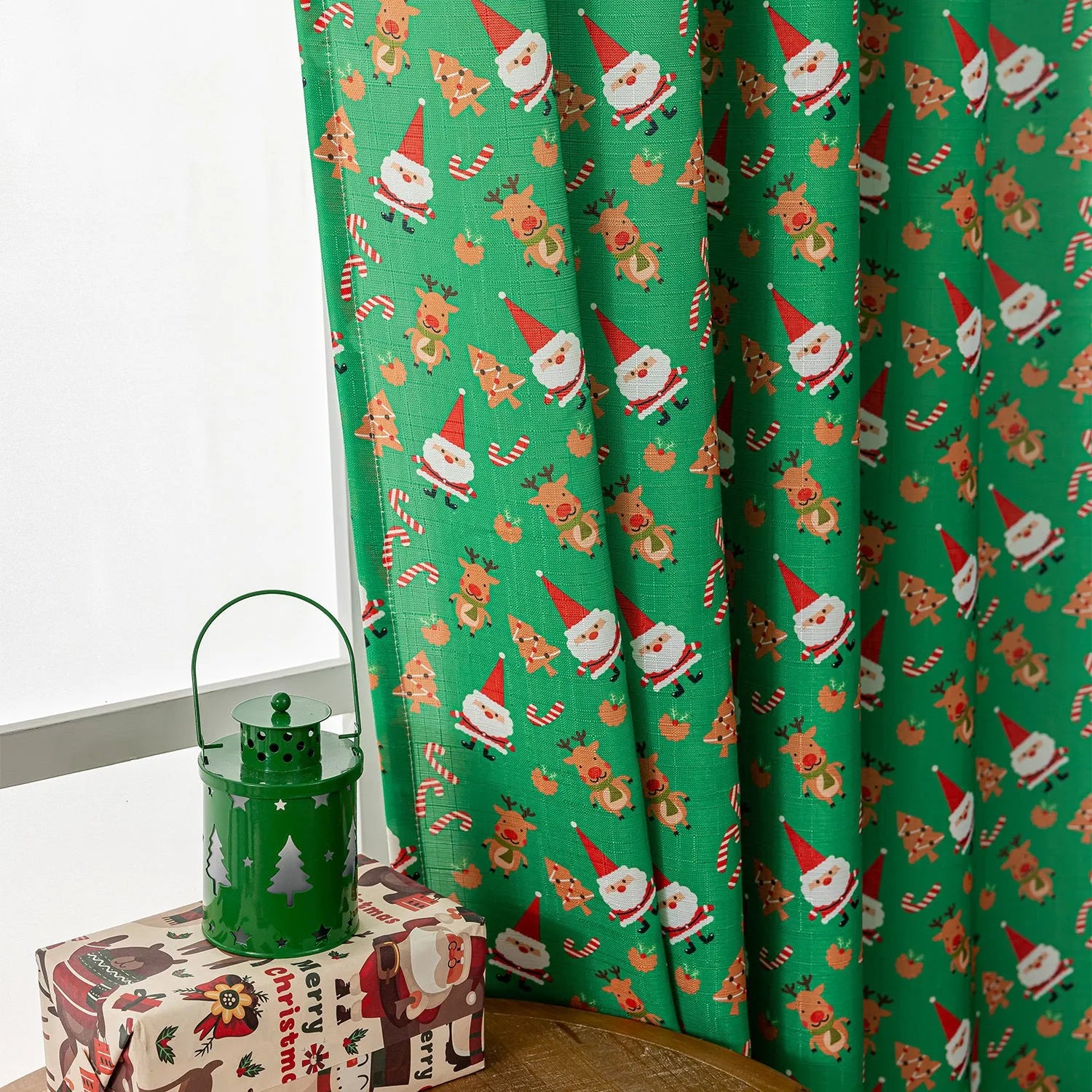 Green Christmas curtain with snowman and angel cartoon print, 1 metre wide