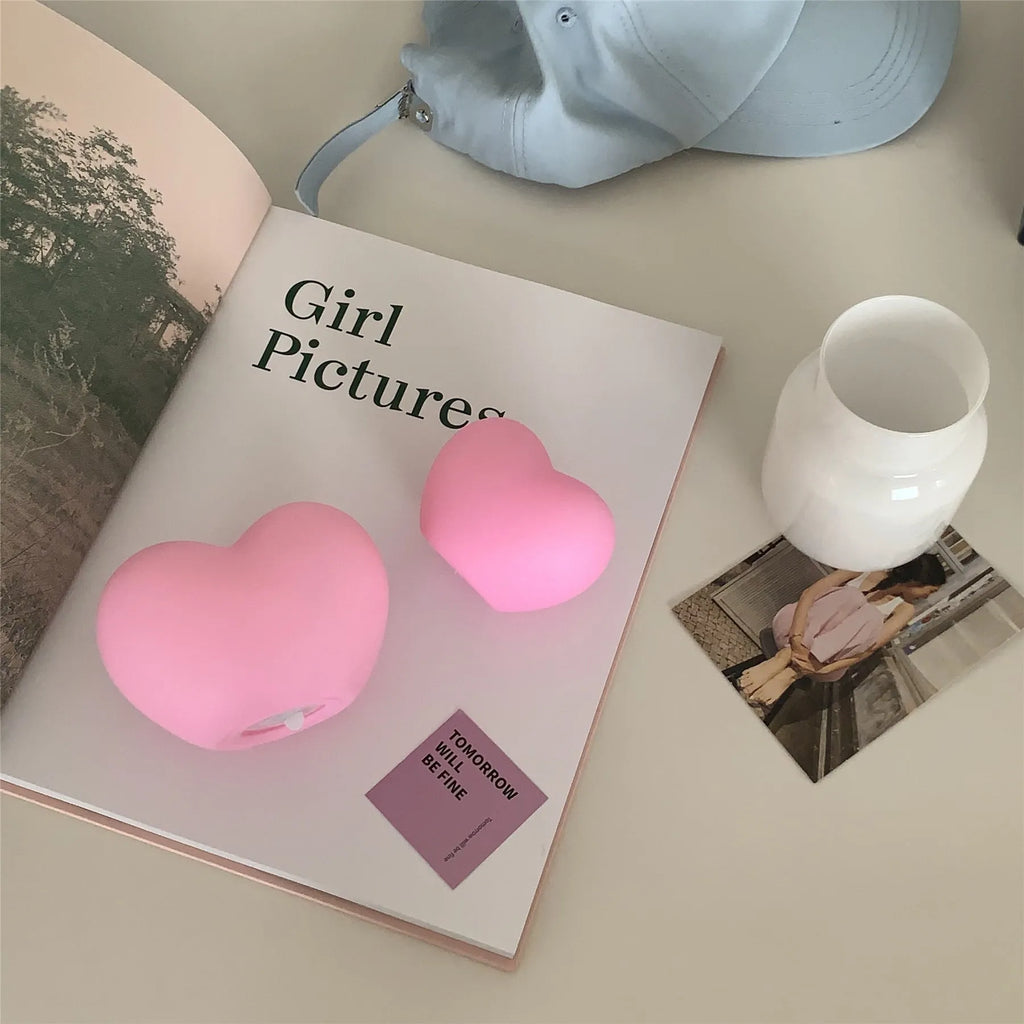 Vinyl atmosphere lamp emitting warm glow light, available in pink or white colours with battery operation
