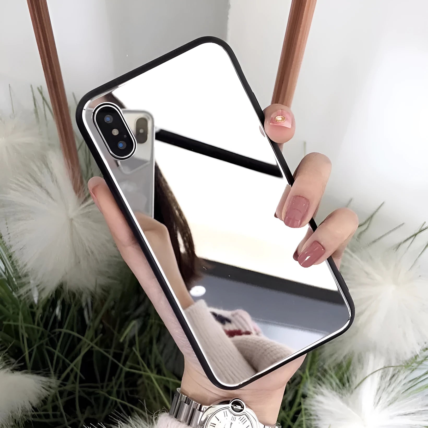 Black iPhone mirror phone case showing reflective back, compatible with iPhone X and 7/8 Plus models.
