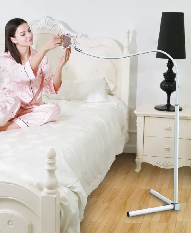 Black mobile phone bed bracket mounted bedside with phone in adjustable overhead viewing position