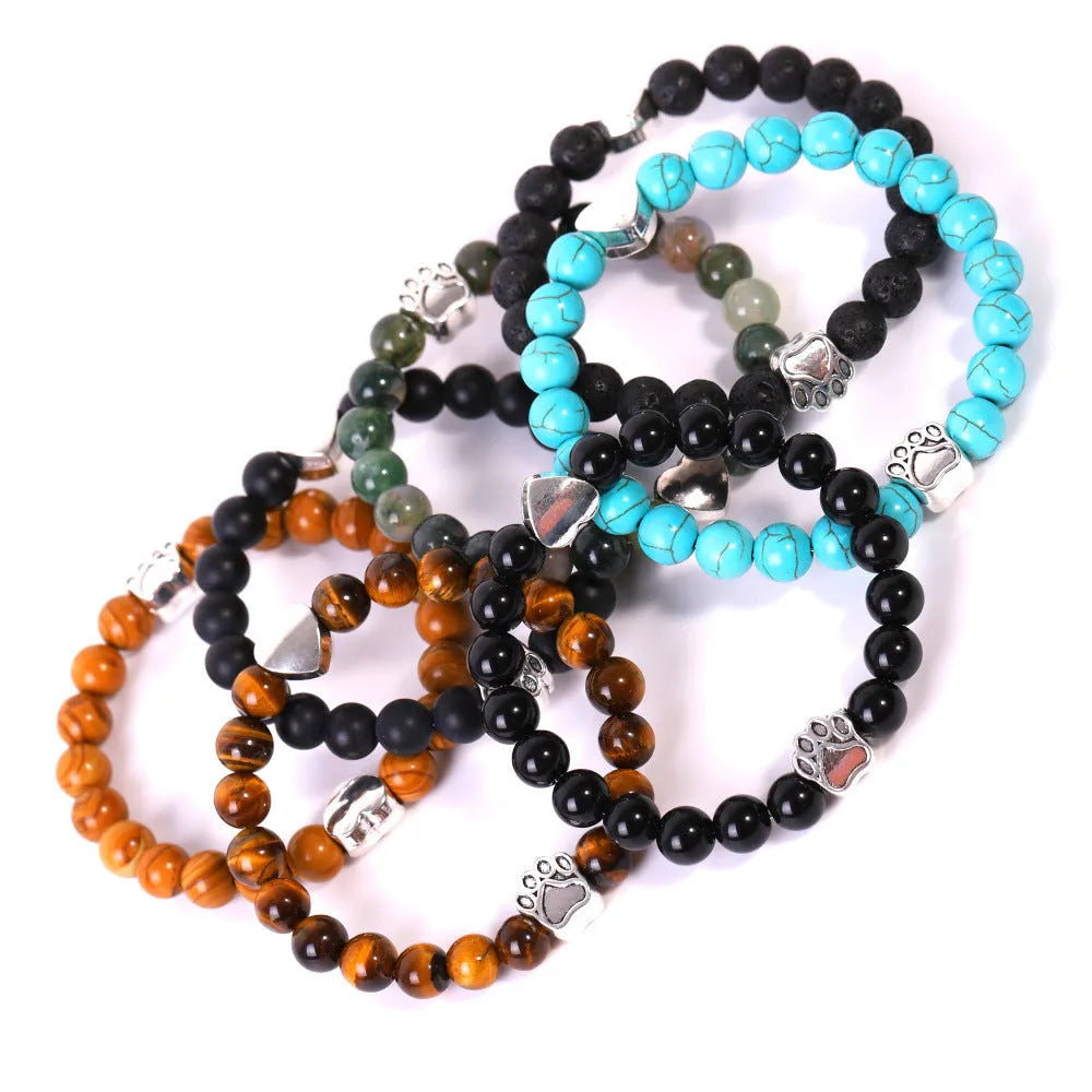 Tigereye Indian agate bracelet with geometric heart charm and dog's paw motifs on wrist